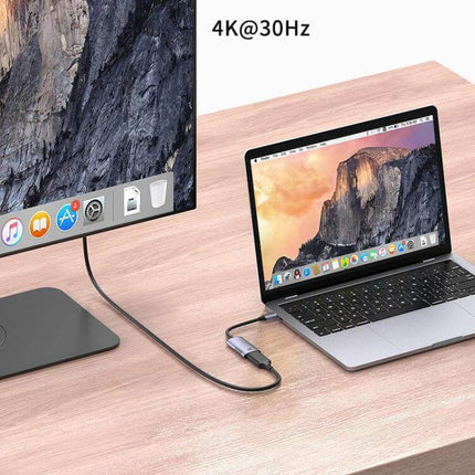 Amalink USB-C to HDMI Adapter for Easy Device Connections connecting laptop to 4K monitor on desk