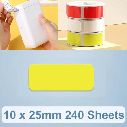 NiiMbot Thermal Adhesive Labels for Everyday Printing Tasks showing rolls of 10x25mm yellow labels and a compact thermal label printer
