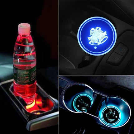 Car Acrylic USB Charger With Multicolor LED Ambience shown in car cupholders glowing red, blue, and teal around a water bottle and engraved acrylic panels