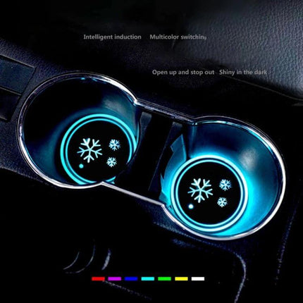Car Acrylic USB Charger With Multicolor LED Ambience glowing blue in car cup holders with laser-engraved icons and subtle ambient light