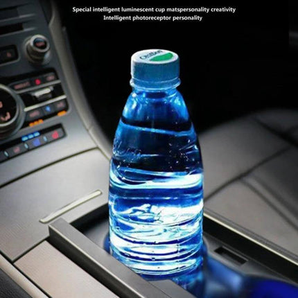 Car Acrylic USB Charger With Multicolor LED Ambience illuminating car cup holder with blue-lit water bottle and laser-engraved acrylic panel