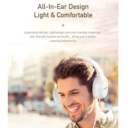 Awei Wired Stereo Headset With Comfortable Ear Cups For Commuting over-ear white headset worn by smiling commuter enjoying music