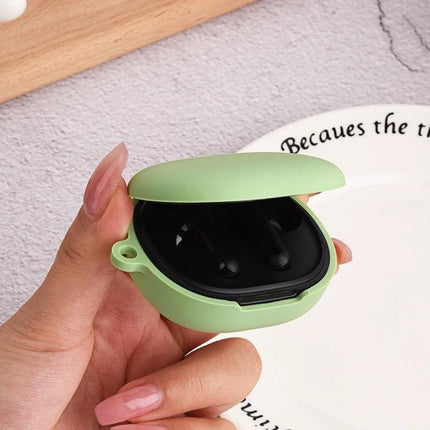 Xiaomi Earbuds Protective Case with Hook for Everyday Use showing green 360-degree cover and hook attached to bag