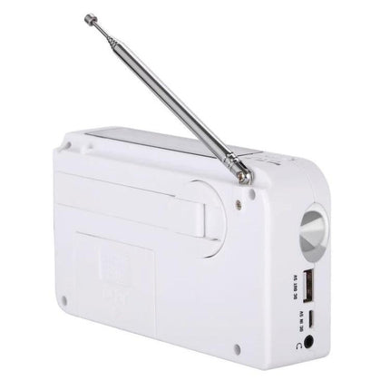 Portable Solar-Powered AM/FM Radio with Flashlight and Dynamo Charger white emergency radio showing antenna, USB port, hand-crank and flashlight