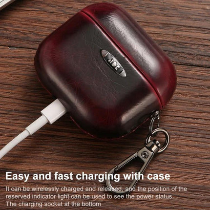 Stylish Leather Case for AirPods in Everyday Protection Activities - PU leather protective AirPods case with keyring and charging access