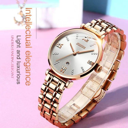 JIN SHI DUN Elegant Waterproof Women's Quartz Watch gold tungsten steel strap with Roman numerals, elegant everyday waterproof women’s timepiece