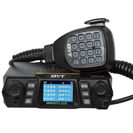QYT KT-980 Plus Dual Band Mobile Radio for Vehicles black mobile unit with microphone on dashboard, VHF UHF display and keypad