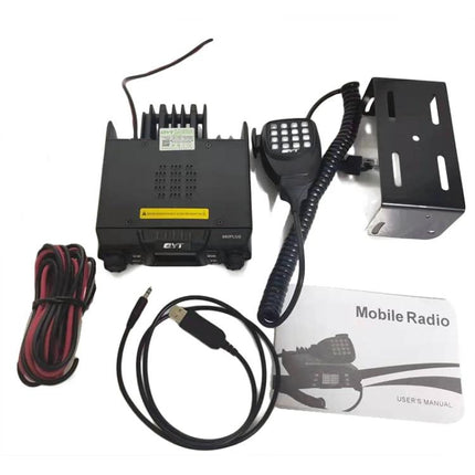 QYT KT-980 Plus Dual Band Mobile Radio for Vehicles mounted in vehicle with microphone, power cable, USB programming cable and manual