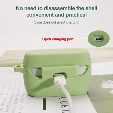Keep your earphones protected during daily activities with this silicone case. Green silicone earphone case showing open charging port and cable connected