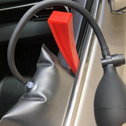 Essential Q1 Kit for Everyday Car Dent Fixes — inflatable air bag and wedge used to push out a car door dent for at-home repairs