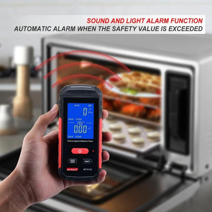 Wintact Household Electromagnetic Radiation Testing Device handheld meter held near a microwave showing readings and alarm indicators