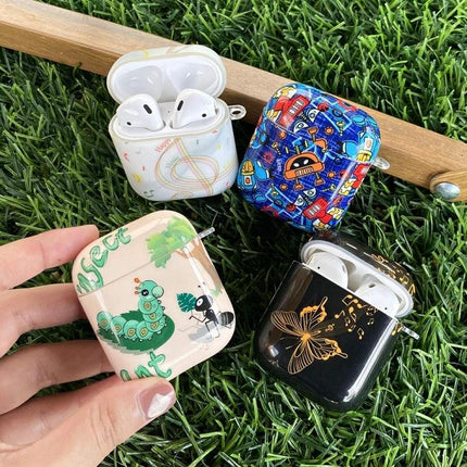 Protect Your AirPods During Daily Commutes with IMD Original Case - colorful patterned protective AirPods cases on grass