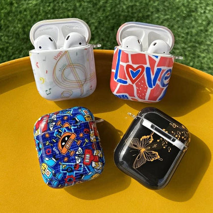 Protect Your AirPods During Daily Commutes with IMD Original Case - four colorful patterned AirPods cases on yellow tray