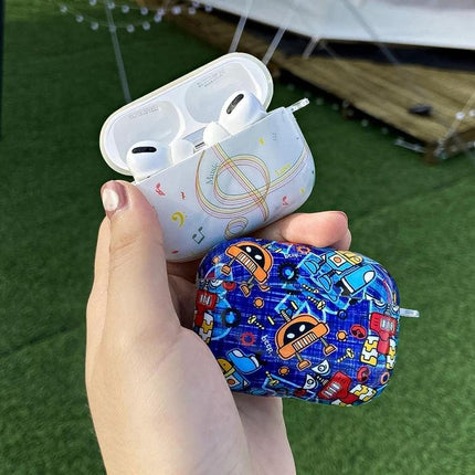 IMD Original Protective Case for AirPods Pro Everyday Use - hand holding two colorful patterned protective cases for AirPods Pro