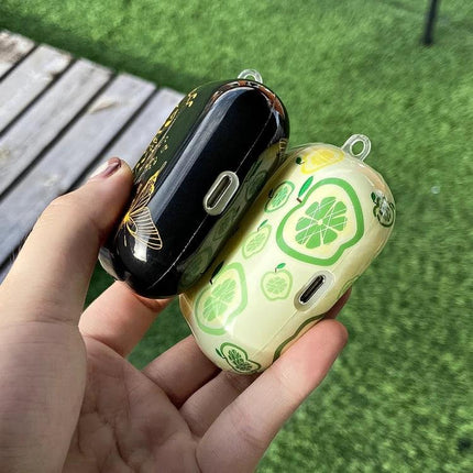 IMD Original Protective Case for AirPods Pro Everyday Use – two decorative 360° protective cases (black floral and green citrus) shown in hand