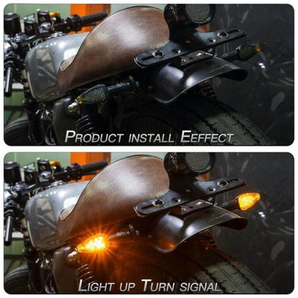 KC025 Motorcycle Turn Signal Lights 2 Pack Black Shell With Yellow Lens installed on motorcycle rear fender showing off and on amber LED illumination