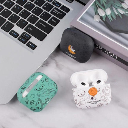 A Simple Protective Case for AirPods in Daily Use – three printed protective AirPods cases on a desk protecting earbuds from scratches and dirt