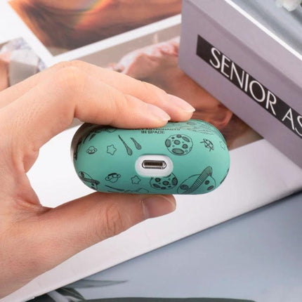 A Simple Protective Case for AirPods in Daily Use - mint green space-print silicone case protecting earbuds during commuting and workouts