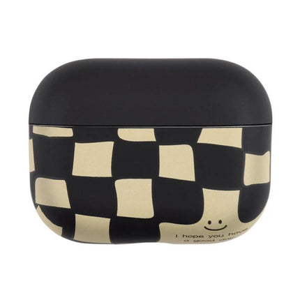 A Simple Protective Case for AirPods in Daily Use - black and beige checkered silicone AirPods case with smiley face protecting earbuds