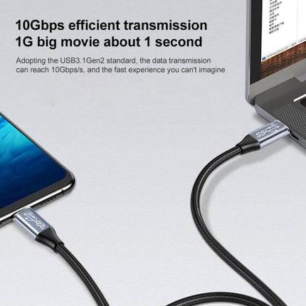 USB-C Charging and Data Transfer Cable with Elbow Connector showing laptop and smartphone connected, 10Gbps fast data transfer, braided cable in desk setup