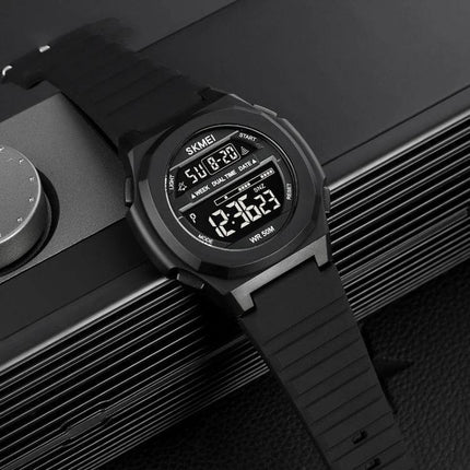 SKMEI Electronic Watch with Silicone Strap for Daily Timekeeping — black digital sports watch with stopwatch, dual time display and waterproof silicone band
