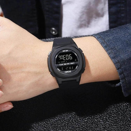SKMEI Electronic Watch with Silicone Strap for Daily Timekeeping on wrist showing digital display, stopwatch and dual time features