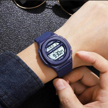 SKMEI Electronic Watch with Silicone Strap for Daily Timekeeping on wrist showing digital display, stopwatch and dual time features