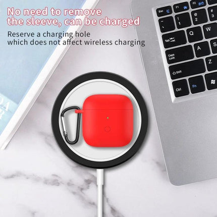 Silicone Case Protects Redmi Earbuds for Daily Activities - red silicone protective case on wireless charger with carabiner