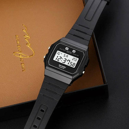 SKMEI Waterproof Electronic Wristwatch for Everyday Wear black resin digital watch on brown box, 50m waterproof, precise electronic timekeeping