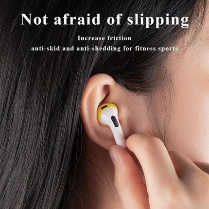 Silicone Earmuffs for Everyday Earphone Protection During Activities - yellow silicone cover on wireless earbud preventing slipping