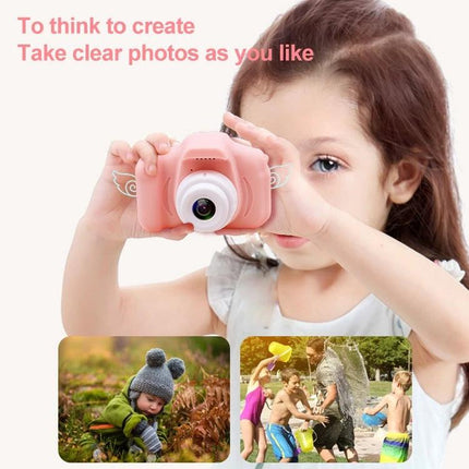 Children's Digital Camera for Kids' Photography and Games - pink kid holding camera capturing outdoor family moments
