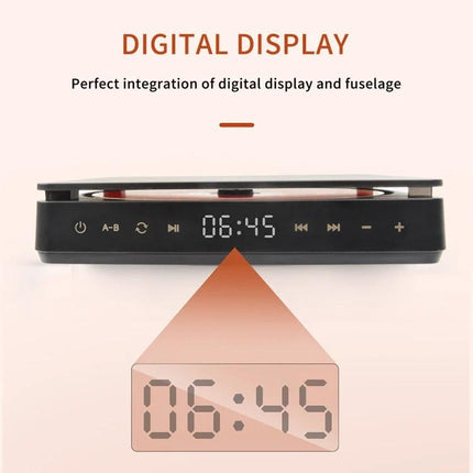 Kecag Portable Retro CD Player for Music on the Go in Black showing digital display and control buttons