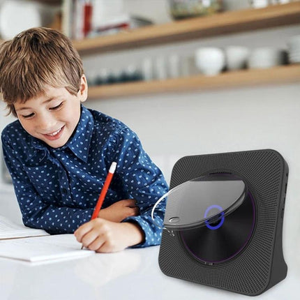 Kecag Retro Bluetooth CD Player with Rechargeable Battery shown near child studying, portable Bluetooth CD player with USB and rechargeable battery