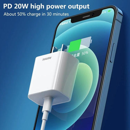 REMAX USB-C Charger for Daily Home Device Powering white 20W PD wall charger topping up smartphone showing 50% charge