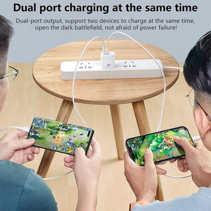 REMAX Charger for Daily Device Powering at Home and Travel showing dual-port charging two smartphones while gaming