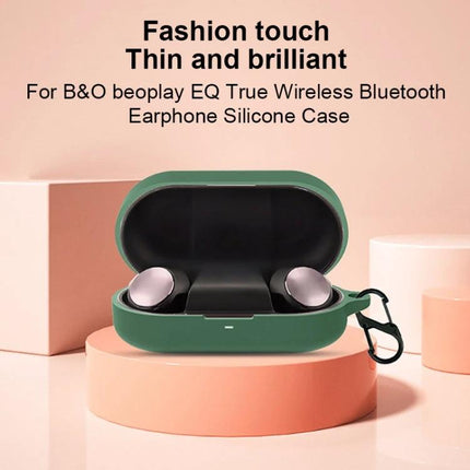 Keep Your Beoplay Earphones Safe with EQ Silicone Cover and Carabiner — green silicone case with earbuds and carabiner attached
