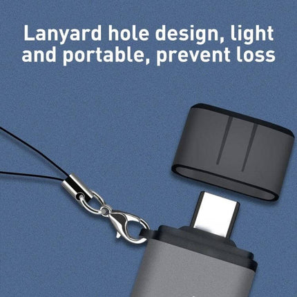Multifunctional OTG Card Reader for SD and Micro SD Cards with Type-C connector, lanyard hole and protective cap for portable file transfers