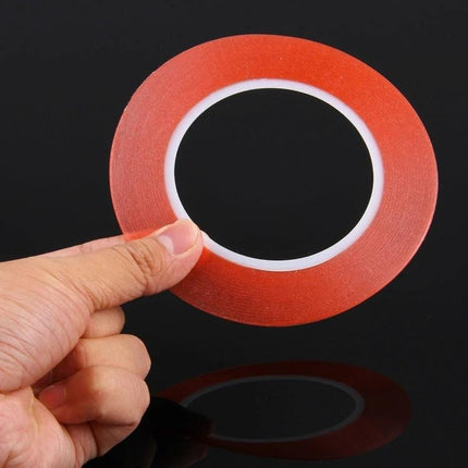Double Sided Adhesive Tape for Phone and Home Repairs, 25m Length - red polyester double-sided tape roll held between fingers for phone and home repairs