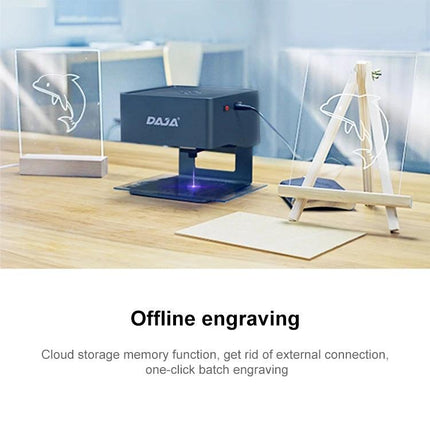 DAJA Mini Laser Engraving Machine for DIY Crafting and Cutting engraving acrylic panels on wooden desk