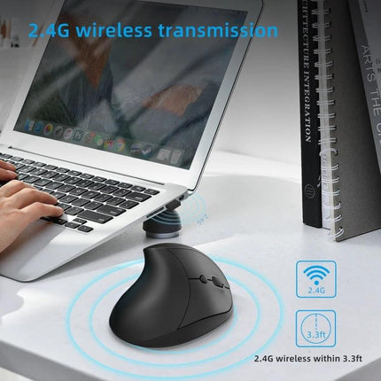 X10 Wireless Vertical Ergonomic Mouse for Everyday Use shown on desk beside laptop demonstrating 2.4G wireless transmission and ergonomic vertical design