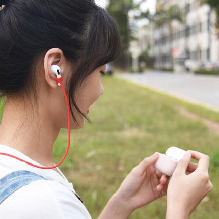 Essential Silicone Set for Everyday Earphone Protection and Travel - woman using earphones with silicone case and cable protector while commuting