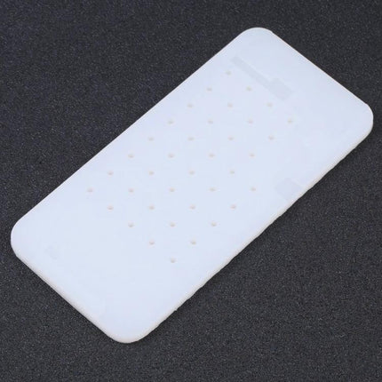 Silicone Glue Removal Pad for iPhone Repair and Maintenance — white silicone pad with perforations for safe adhesive removal during screen and LCD repairs