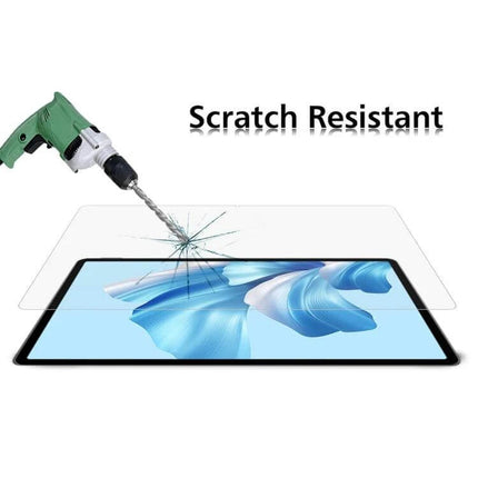 Tempered Glass Screen Protectors for Tablets, 25 Pack Set - scratch resistant ultra-thin protector shown with drill impact demo