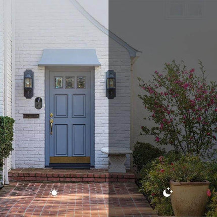 Wireless Mini Smart Video Doorbell with Two-Way Audio mounted beside a blue front door showing day and night monitoring