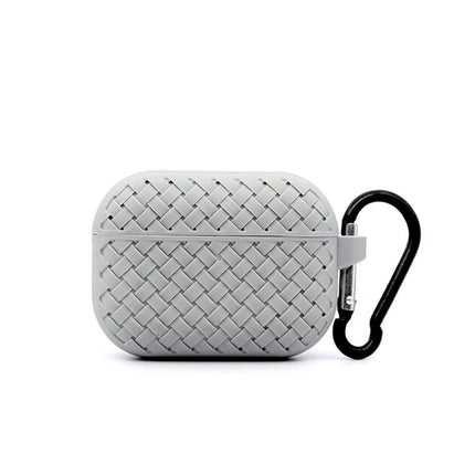 Protective Case for Safeguarding AirPods in Daily Life – woven silicone cover with charging port access and carabiner