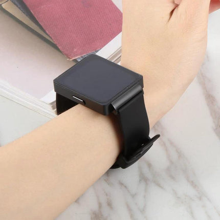 Essential Smart Watch for Daily Health and Activity Tracking on wrist showing sleek black square display tracking heart rate and steps