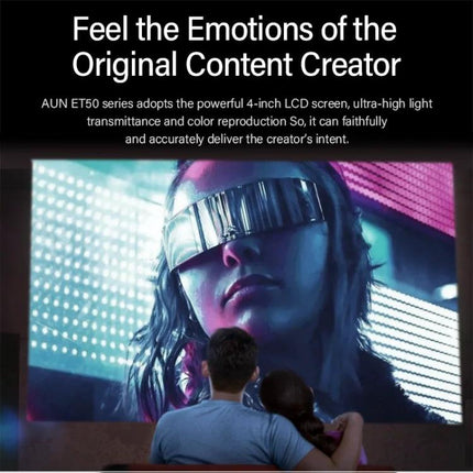 AUN ET50 Portable LED Mini Projector for Home Viewing projecting a large colorful movie scene on a wall with a couple watching