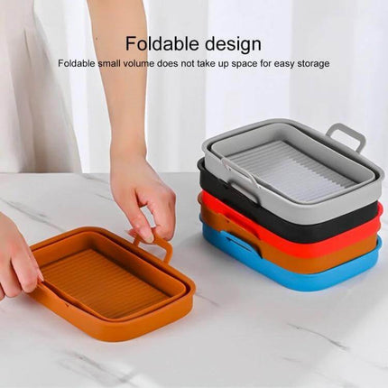 Rectangular Foldable Silicone Air Fryer Basket showing colorful collapsible silicone liners stacked and one being folded for compact storage