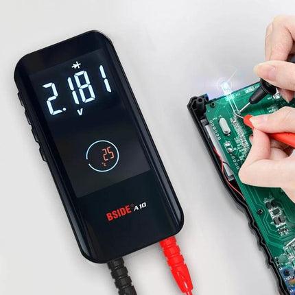 BSIDE A10 Portable Multimeter for Everyday Electrical Testing measuring 2.181V on a circuit board during troubleshooting