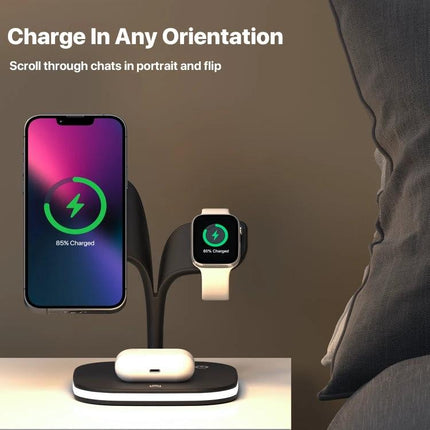 Keep devices charged at home with this versatile stand charger shown charging a smartphone, smartwatch and earbuds on a nightstand